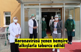 Koronavirüsü yenen hemşire alkışlarla taburcu edildi