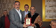 HİZMETLERİ PLAKETLE ÖDÜLLENDİRİLDİ