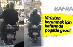 Virüsten korunmak için kafasında poşetle gezdi